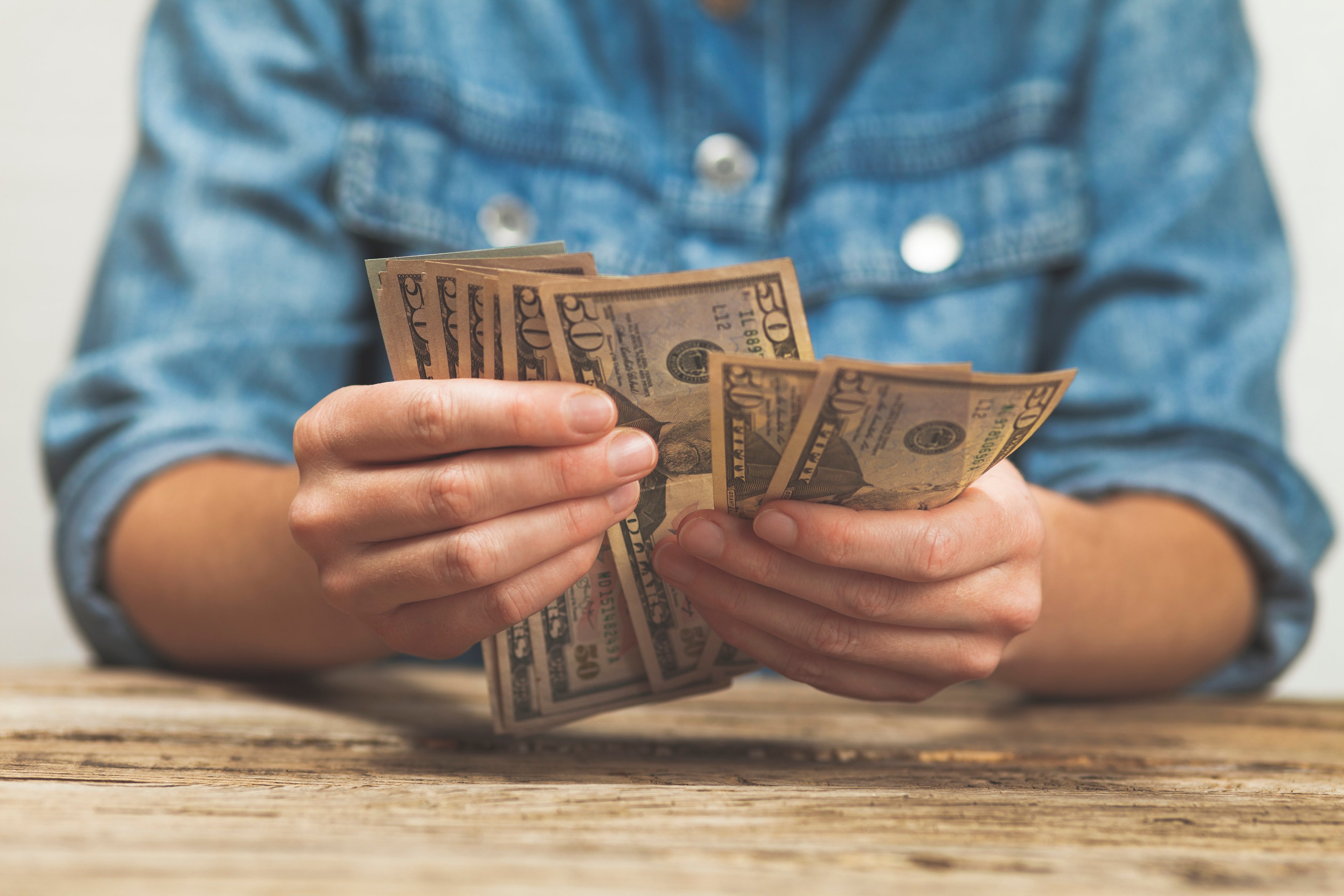 Dollars in hand