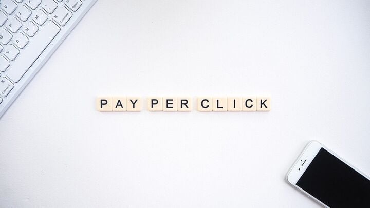 Scrabble tiles spelling out "Pay Per Click"