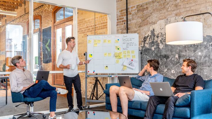 business meeting with whiteboard