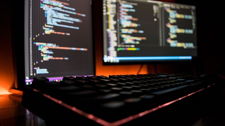 computer screens with code