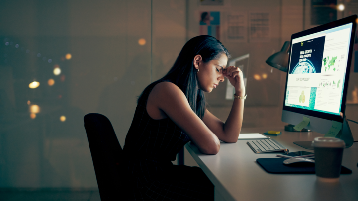 Stressed woman in front of a computer. 