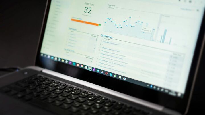 Laptop showing analytics dashboard for Shopify SEO audit