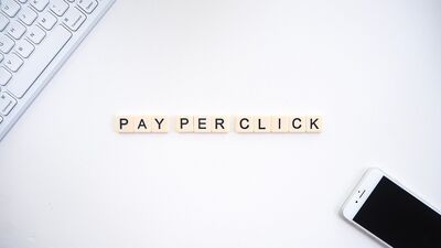 Scrabble tiles spelling out "Pay Per Click"