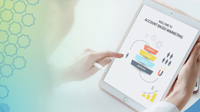 Hand pointing to a tablet that has an ABM chart on it