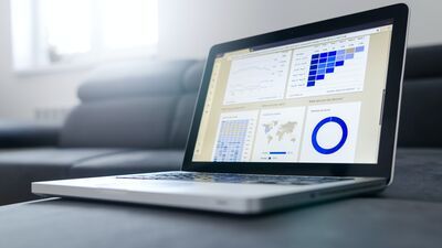 image of laptop showing Google Analytics dashboard