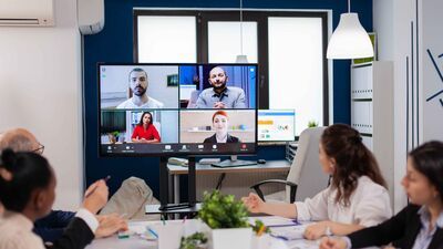 Distributed teams having a video meeting and sharing ideas