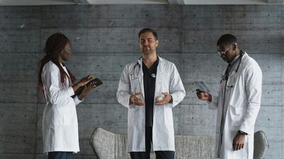 Healthcare professionals discussing clinician-influenced product launch
