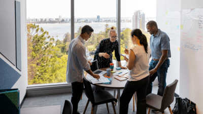 Coworkers having a team meeting. 