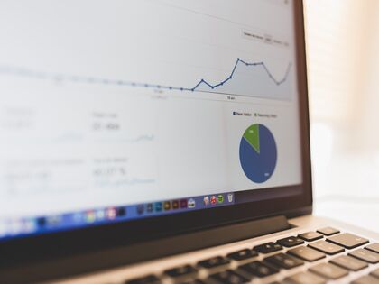 Image of a computer screen showing graphs and a pie chart