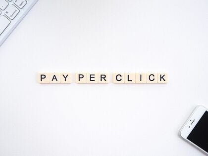 Scrabble tiles spelling out "Pay Per Click"