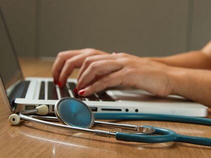 laptop and stethoscope