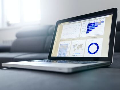 image of laptop showing Google Analytics dashboard