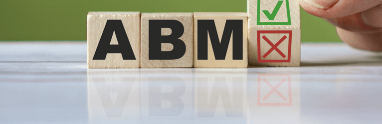 Wooden blocks with the letters A B M on them