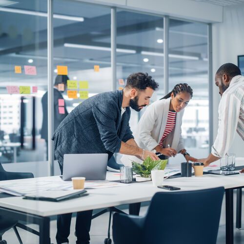Diverse Team of Professional Businesspeople Meeting in the Office Conference Room
