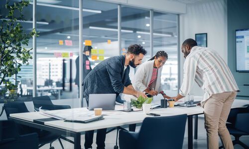 Diverse Team of Professional Businesspeople Meeting in the Office Conference Room