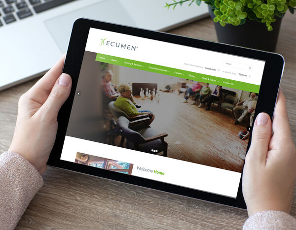 Ecumen website shown on an iPad