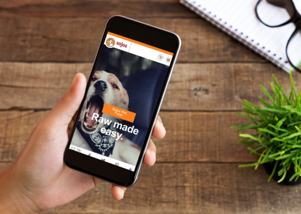 Sojos website shown on a smartphone