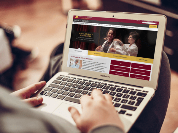 UMN Med School website shown on a laptop