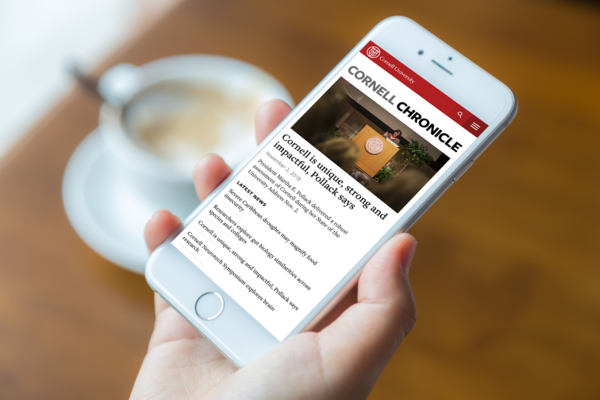 Cornell news website shown on a smartphone