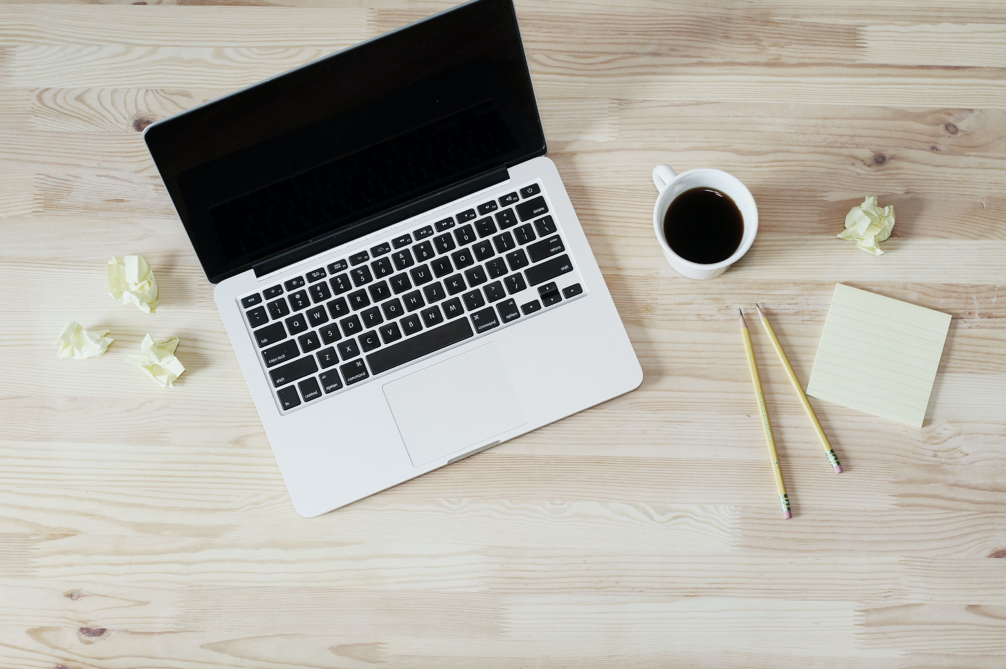 laptop and crinkled paper