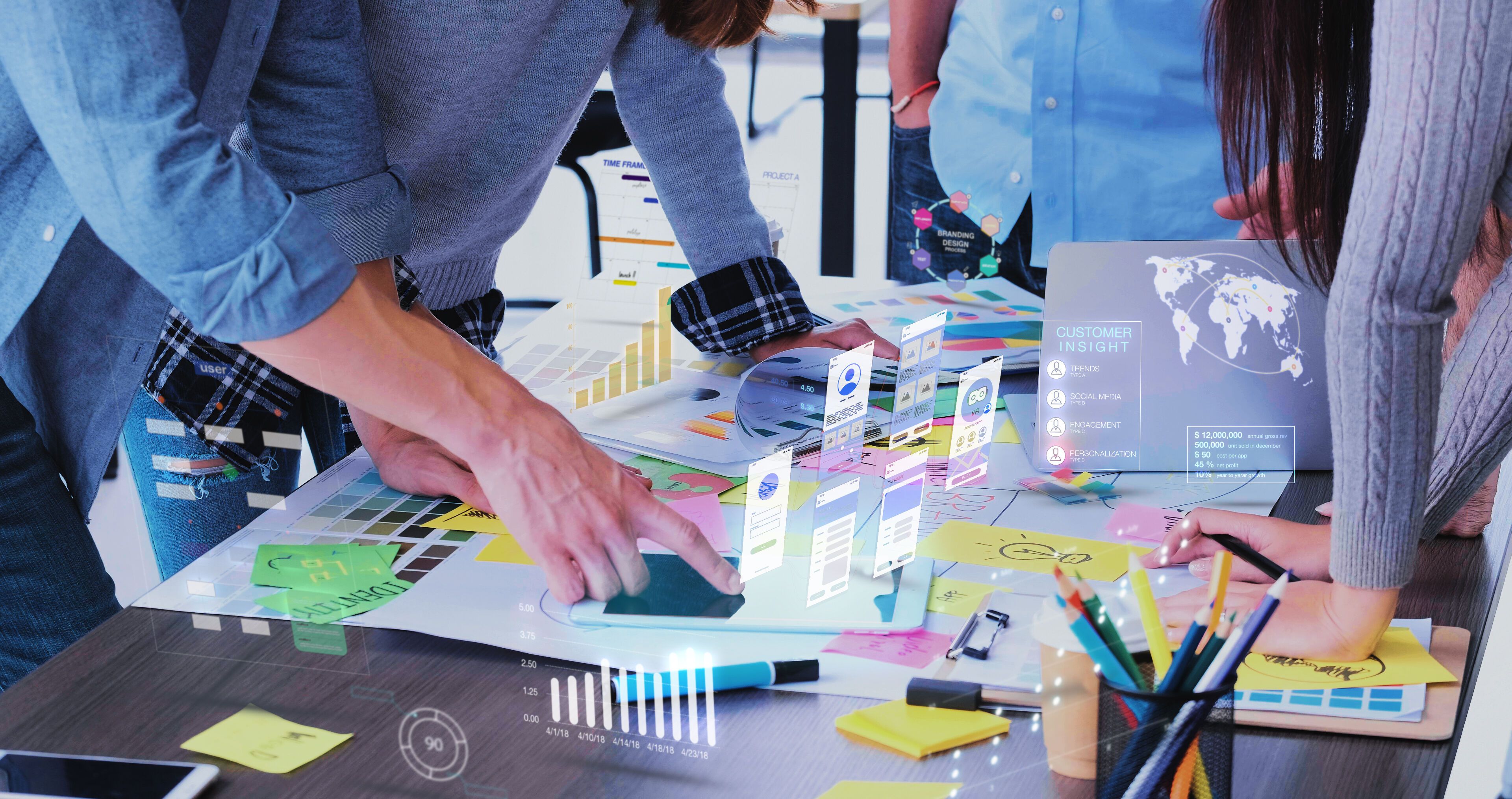 Close up ux developer and ui designer use augmented reality app brainstorming about mobile interface wireframe design on desk at modern office