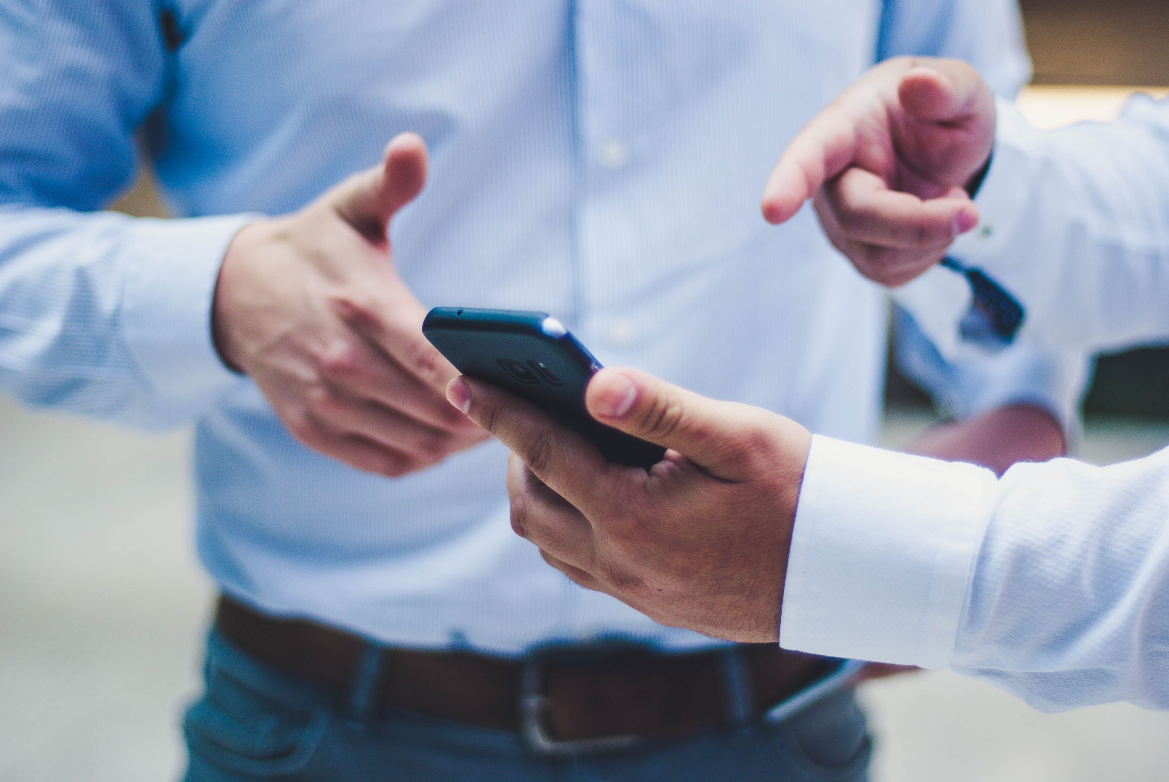 Image of hand holding a cell phone