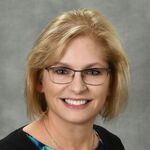 Macaire Merkel headshot